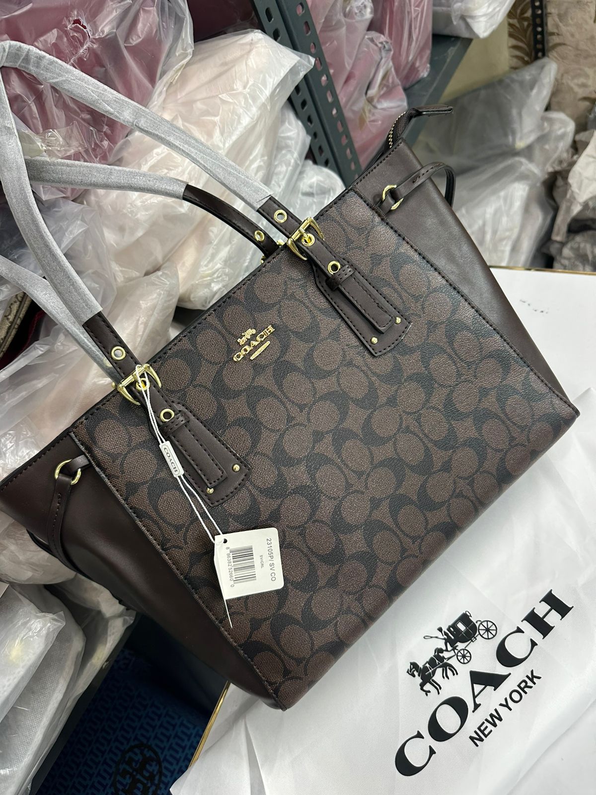 COACH VOYAGER PRINT TOTE BAG