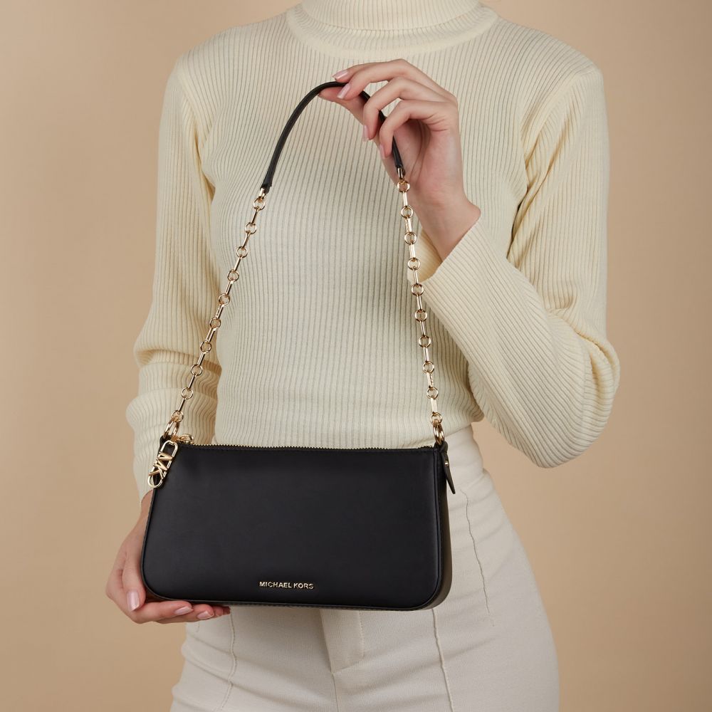 MICHAEL KORS SLING BAG