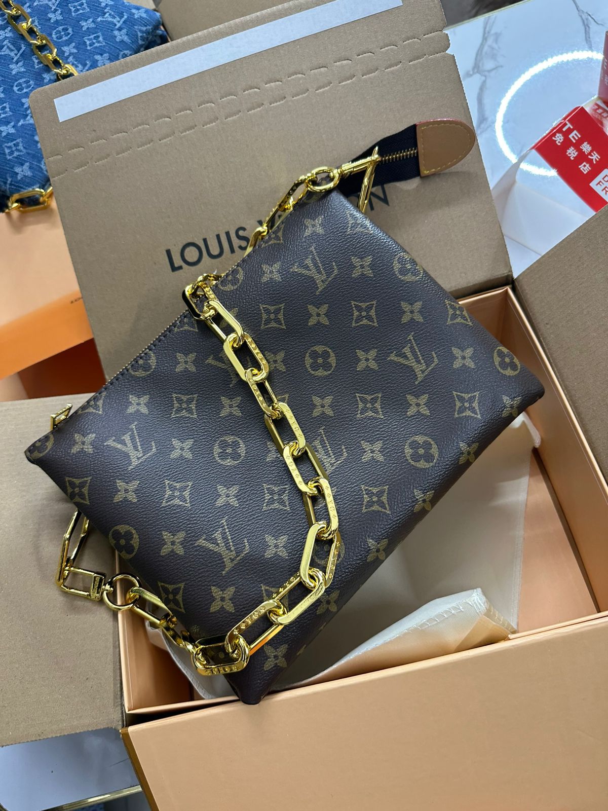 LOUIS VUITTON COUSSIN