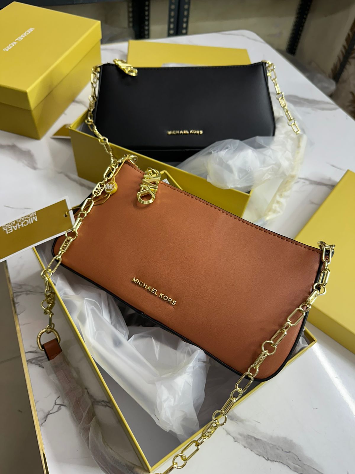 MICHAEL KORS SLING BAG