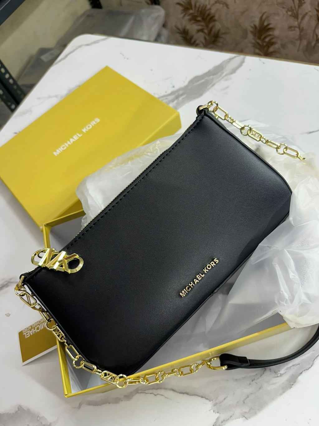 MICHAEL KORS SLING BAG