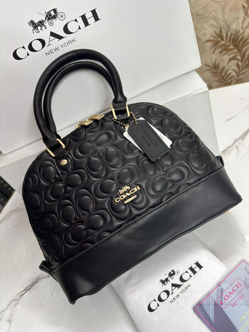COACH EMBOSSED ALMA BAG